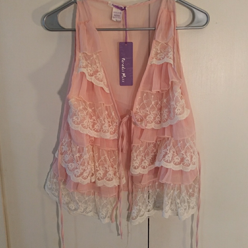 Girly frilled vest with lace detailing.